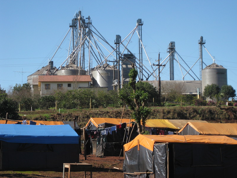 MST encampment in Rio Grande do Sul, next to a large agribusiness. Credit: Rebecca Tarlau